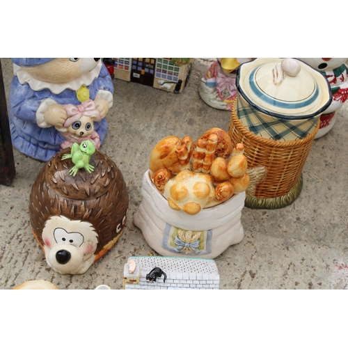 1683 - AN ASSORTMENT OF NOVELTY CERAMIC TEAPOTS AND BISCUIT BARRELS