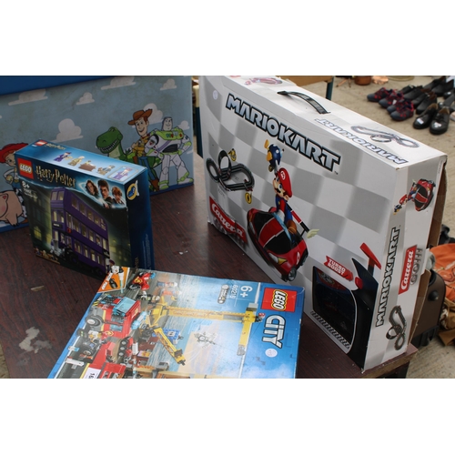 1684 - AN ASSORTMENT OF TOYS TO INCLUDE A BOXED LEGO CITY SET, A HARRY POTTER LEGO NIGHT BUS AND A MARIOKAR... 