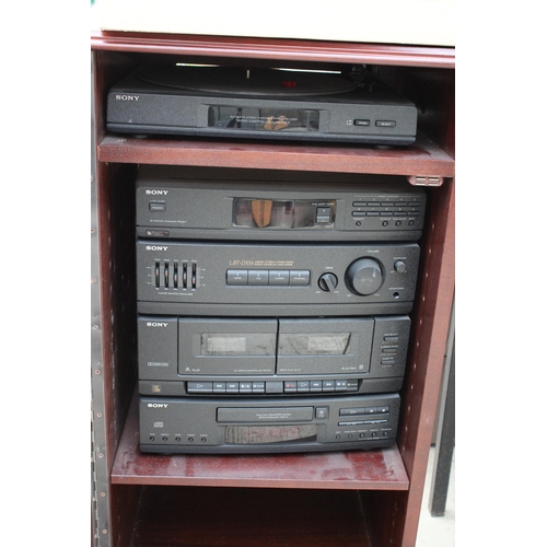 1687 - A CABINET WITH A SONY STEREO SYSTEM AND AN ASSORTMENT OF LP RECORDS