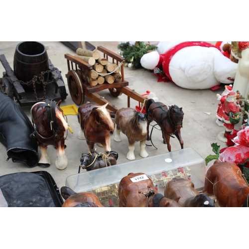 1742 - AN ASSORTMENT OF CERAMIC MODEL HORSES TO INCLUDE TWO CARTS