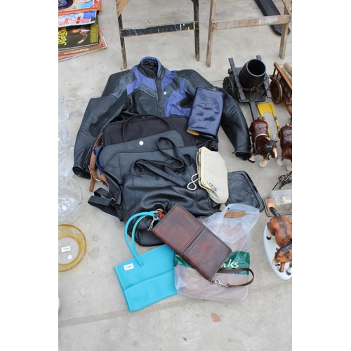 1743 - A MOTORBIKE JACKET AND AN ASSORTMENT OF LADIES HANDBAGS