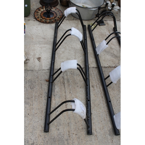 1751 - A METAL FOUR SECTION BIKE RACK