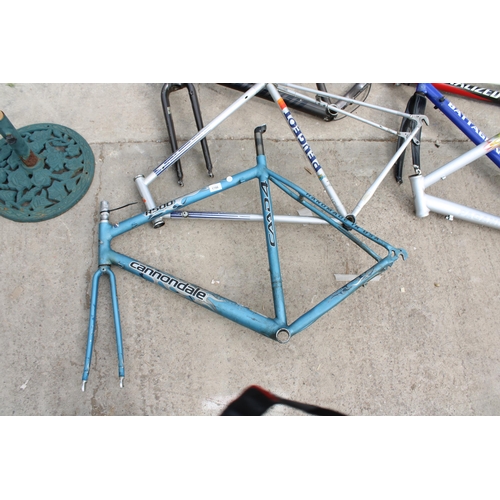 1786 - THREE VARIOUS BIKE FRAMES TO INCLUDE A CANNONDALE AND A PEUGEOT ETC