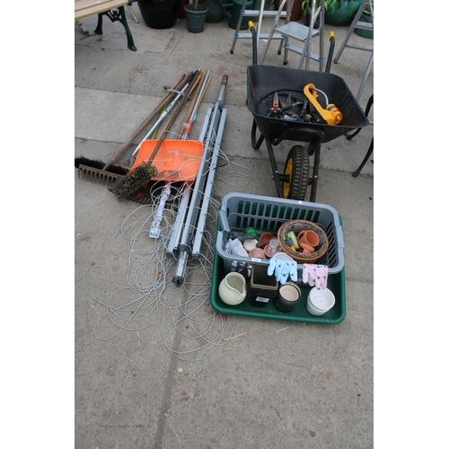 1793 - AN ASSORTMENT OF GARDEN TOOLS TO INCLUDE A WHEEL BARROW, A WASHING LINE AND BRUSHES ETC