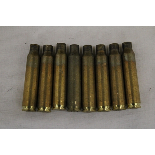 162 - A QUANTITY OF BRASS BULLET CASES