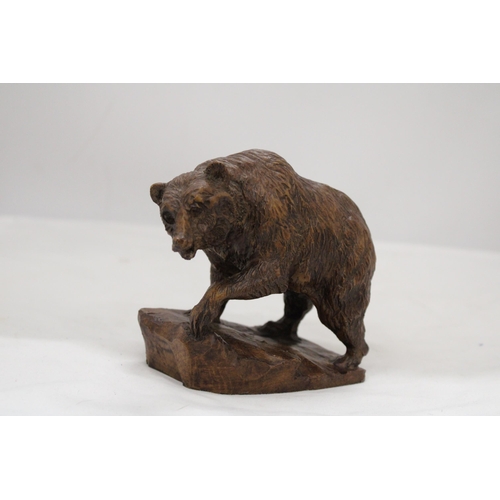 168 - A HAND CARVED BEAR FIGURE, SIGNED, HEIGHT 12CM