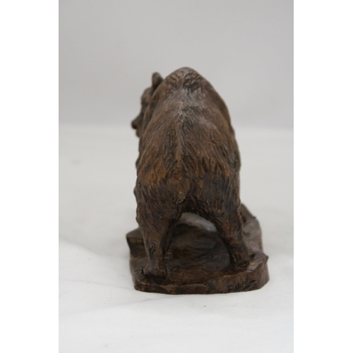 168 - A HAND CARVED BEAR FIGURE, SIGNED, HEIGHT 12CM