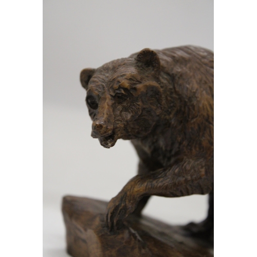 168 - A HAND CARVED BEAR FIGURE, SIGNED, HEIGHT 12CM