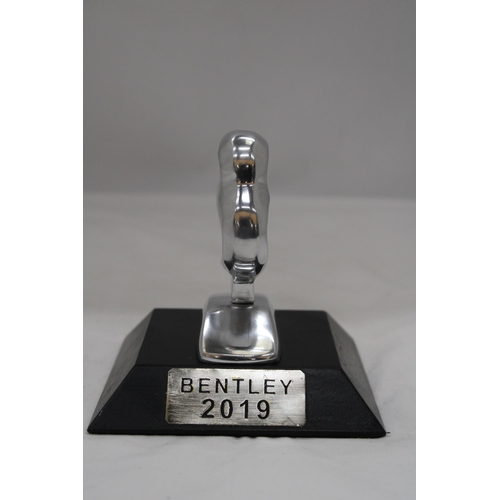 174 - A 2019, CHROME BENTLEY 'B' ON A BASE, HEIGHT APPROX 13CM