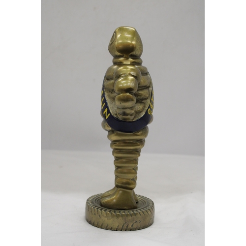 175 - A CAST MICHELIN FIGURE, HEIGHT 28CM