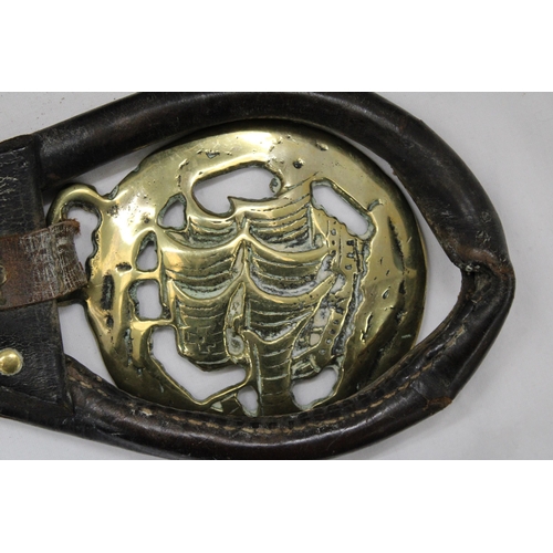 177 - TWO HORSE BRASSES ON LEATHER STRAPS