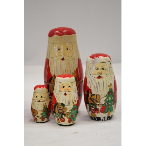 207 - A RUSSIAN NESTING DOLL AND FATHER CHRISTMAS