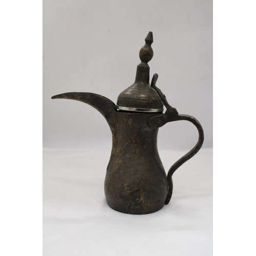 239 - A VINTAGE EASTERN COFFEE POT, HEIGHT 30CM