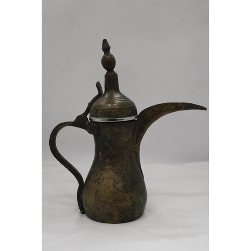 239 - A VINTAGE EASTERN COFFEE POT, HEIGHT 30CM