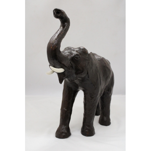 241 - A VINTAGE LEATHER ELEPHANT, HEIGHT 35CM