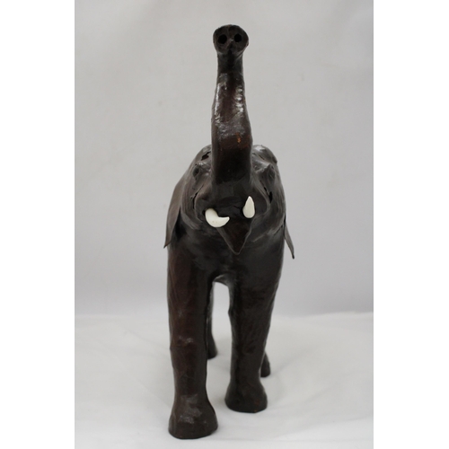 241 - A VINTAGE LEATHER ELEPHANT, HEIGHT 35CM