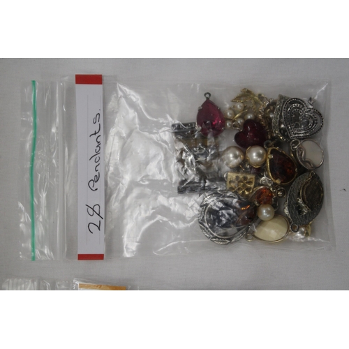 243 - A QUANTITY OF COSTUME JEWELLERY TO INCLUDE RINGS, BRACELETS AND PENDANTS