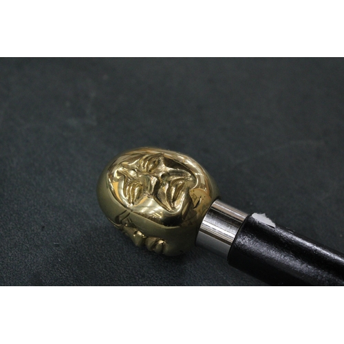 817 - A BRASS FOUR FACED BUDDHA HANDLE WALKING STICK