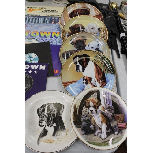 818 - SEVEN BOXER DOG COLLECTORS PLATES WITH PLATE STANDS