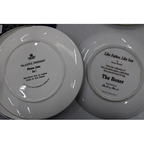 818 - SEVEN BOXER DOG COLLECTORS PLATES WITH PLATE STANDS