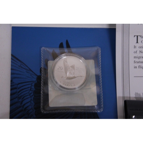 469 - A COLLECTION OF COINS TO INCLUDE A 2014 CANADA GOOSE  FINE SILVER $20 COIN, A MONNAIE DE PARIS S.M.L... 