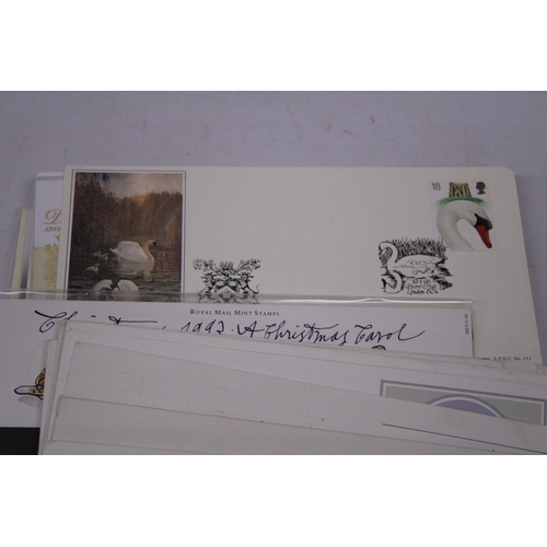 478 - A COLLECTION OF FIRST DAY COVERS AND UNUSED COMMERMORATIVE STAMPS