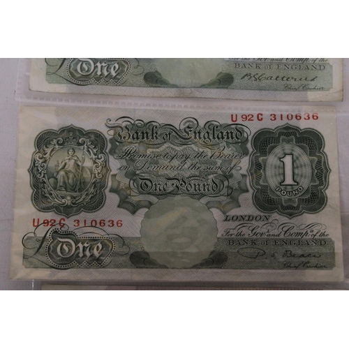 479 - TWO ONE POUND NOTES  AND A TEN SHILLING NOTE