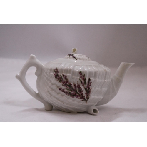 781 - A BELLEEK SHELL DESIGN TEAPOT