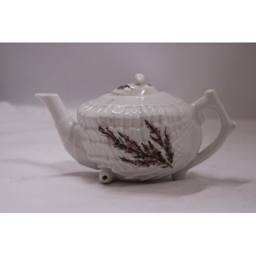 781 - A BELLEEK SHELL DESIGN TEAPOT