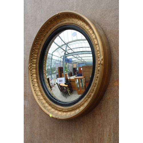 2981 - A MID 20TH CENTURY ATSONEA CONVEX GILT FRAMED WALL MIRROR, 16