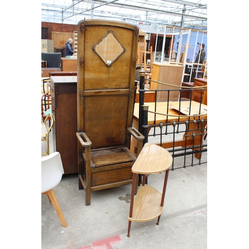 3009 - A MID TWENTIETH CENTURY OAK MIRRORED HALL STAND AND DEMI-WINE HALL TABLE