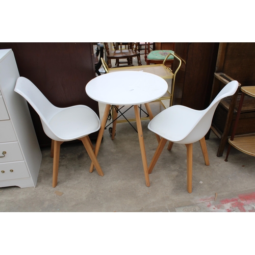 3010 - A WHITE MELAMINE TABLE ON KICK OUT LEGS 24