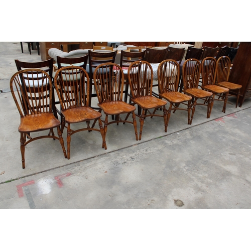 3024 - A SET OF EIGHT ELM R.W.F.CO WINDSOR STYLE DINING CHAIRS WITH STICK BACKS AND CRINOLINE BOWS