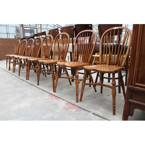 3024 - A SET OF EIGHT ELM R.W.F.CO WINDSOR STYLE DINING CHAIRS WITH STICK BACKS AND CRINOLINE BOWS