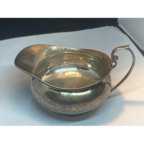 97 - A HALLMARKED BIRMINGHAM SILVER SAUCE BOAT