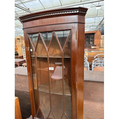 2904 - A MODERN CORNER CUPBOARD WITH GLAZED UPPER PORTION