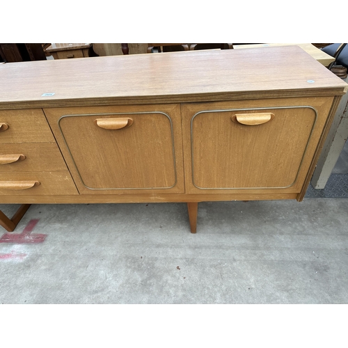 2924 - A RETRO TEAK SIDEBOARD ENCLOSING THREE DRAWERS AND THREE CUPBOARDS, 72