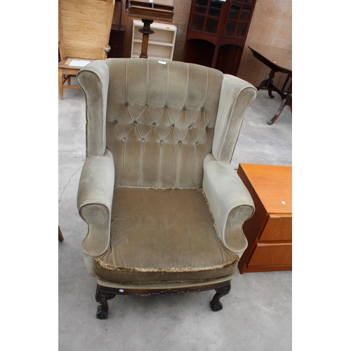 2942 - A GEORGION STYLE WINGED BUTTON-BACK EASY CHAIR ON FRONT CABRIOLE LEGS WITH CARVED KNEES ON BALL AND ... 