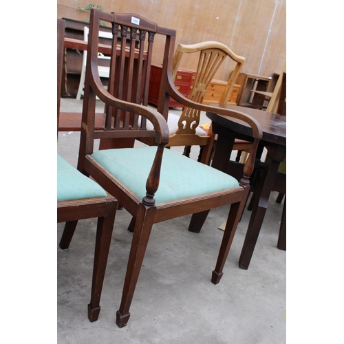 2958 - AN EDWARDIAN MAHOGANY AND INLAID CARVER CHAIR AND MATCHING DINING CHAIR