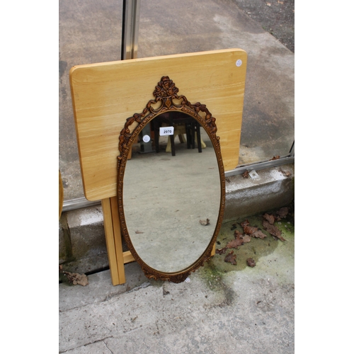 2970 - A MODERN OVAL METALWARE FRAMED WALL MIRROR AND FOLDING TABLE