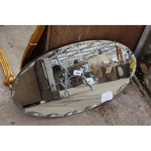 2993 - AN OVAL FRAMELESS WALL MIRROR, 26