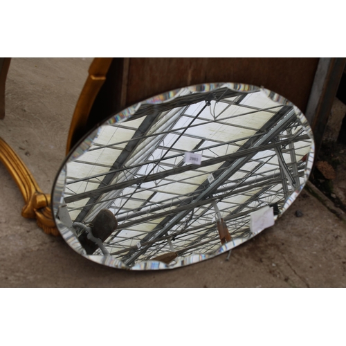 2993 - AN OVAL FRAMELESS WALL MIRROR, 26