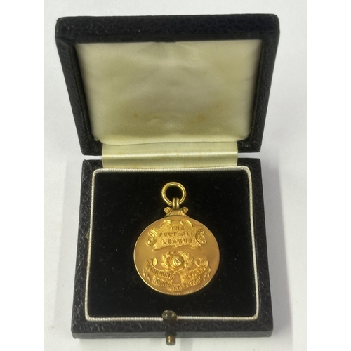 5 - A HALLMARKED 9 CARAT GOLD FOOTBALL LEAGUE DIVISION 3 NORTHERN SECTION LEAGUE WINNERS MEDAL 1953-1954...