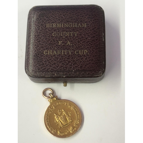 7 - A HALLMARKED 9 CARAT GOLD BIRMINGHAM COUNTY FOOTBALL ASSOCIATION CHARITY CUP JOINT WINNERS MEDAL 193... 