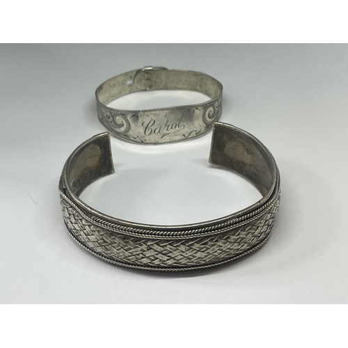 521 - TWO SILVER BANGLES