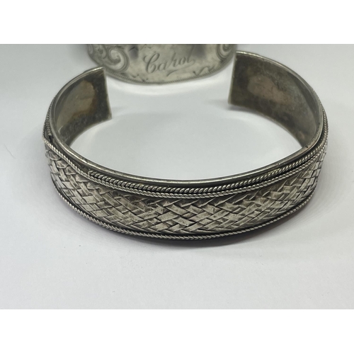 521 - TWO SILVER BANGLES