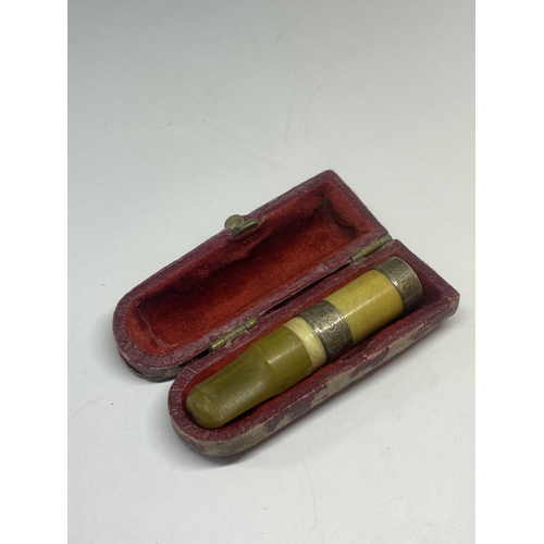 529 - A SILVER AND BUTTERSCOTCH AMBER CHEROOT HOLDER