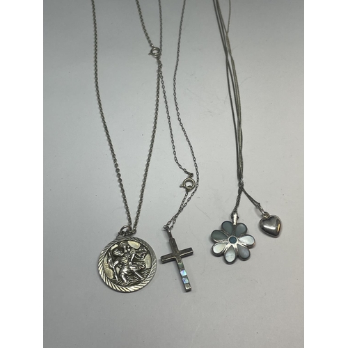 544 - FOUR SILVER NECKLACES WITH PENDANTS