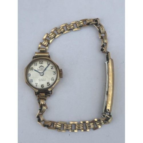 514 - A 9CT GOLD CASED LADIES LIMIT OF SWITZERLAND WATCH, WITH 17 JEWEL MOVEMENT