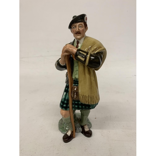 715 - A ROYAL DOULTON FIGURE 